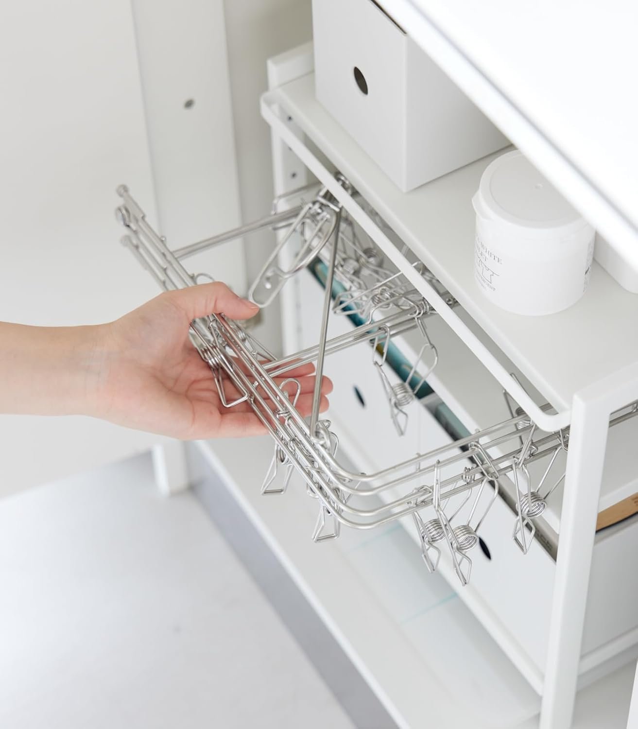61nRKZ+iZ0L._AC_SL1500_ Height-Adjustable Under-Sink Storage Rack – 3-Tier White Steel Organizer with Hooks - Image 8